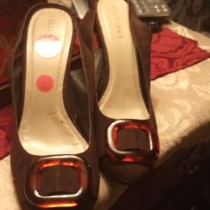 A pair of beautiful brown suede heels